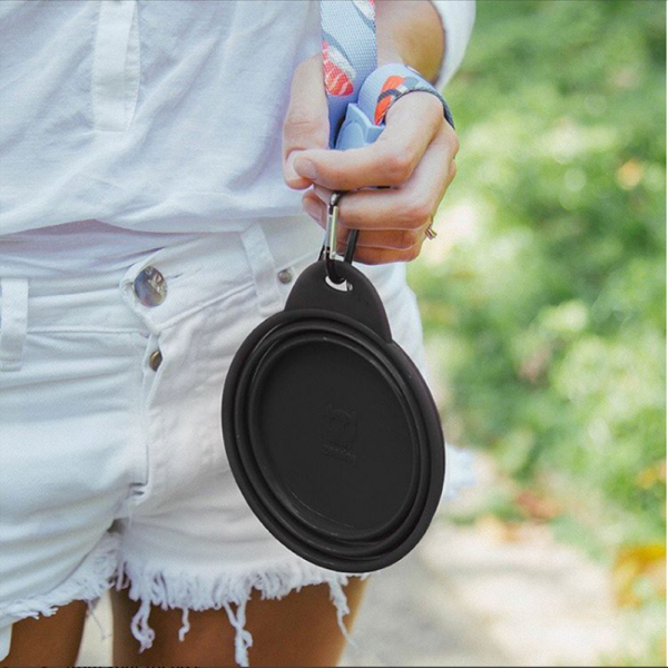 dog bowl for food and drink at walk. oink and black color.